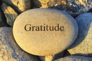 Stone with words gratitude etched