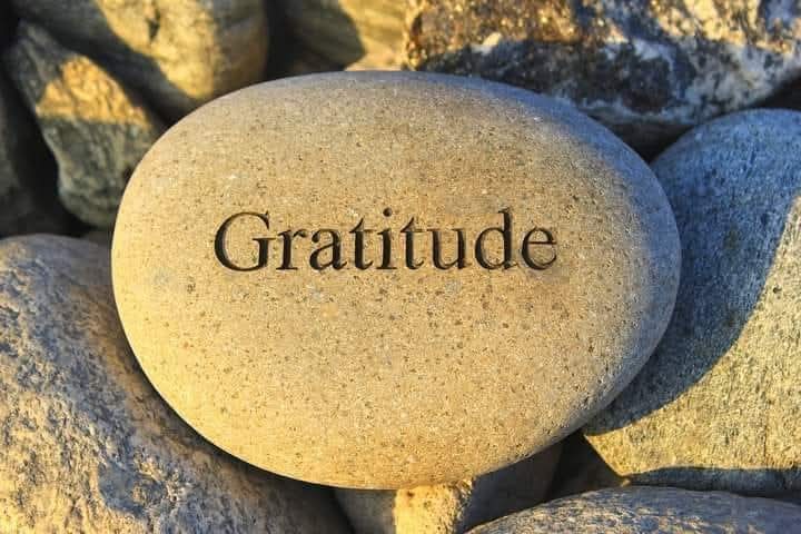 Stone with words gratitude etched