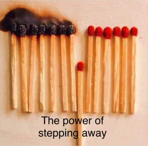 Set of matches burning to left with a match placed lower to prevent the other matches setting alight